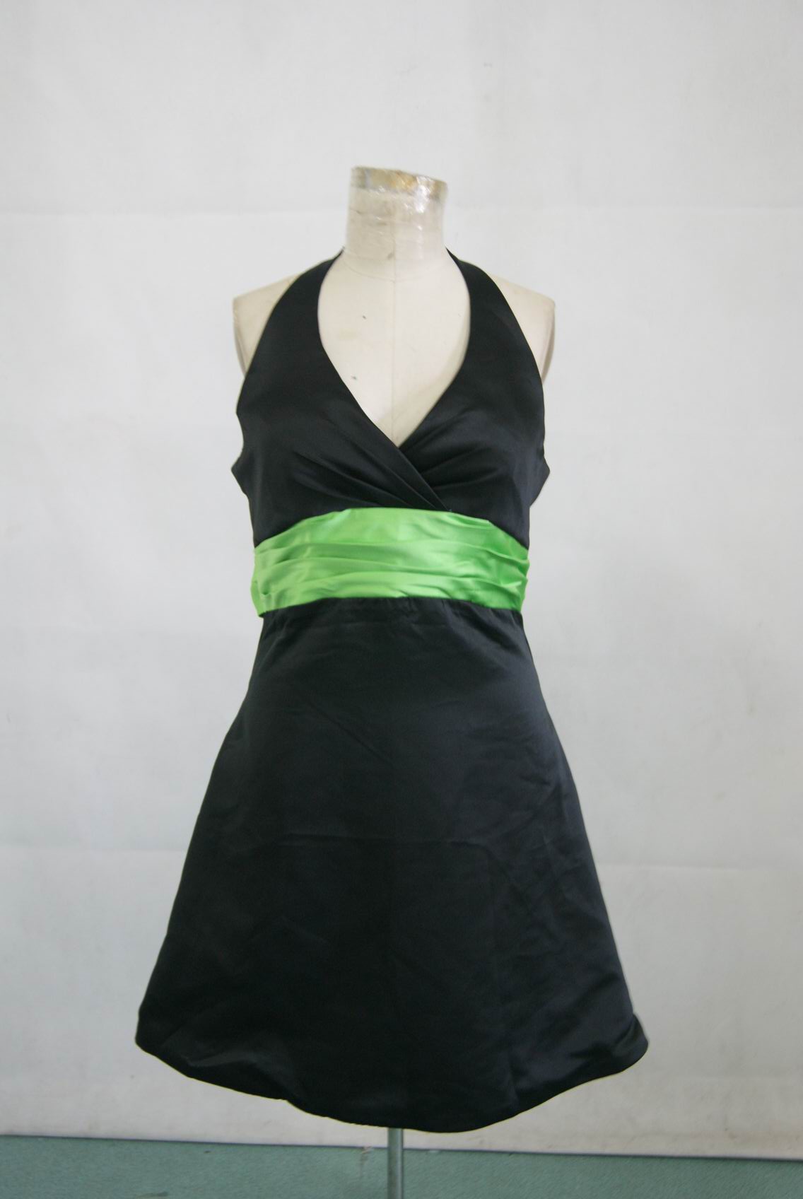 black dress with lime green sash