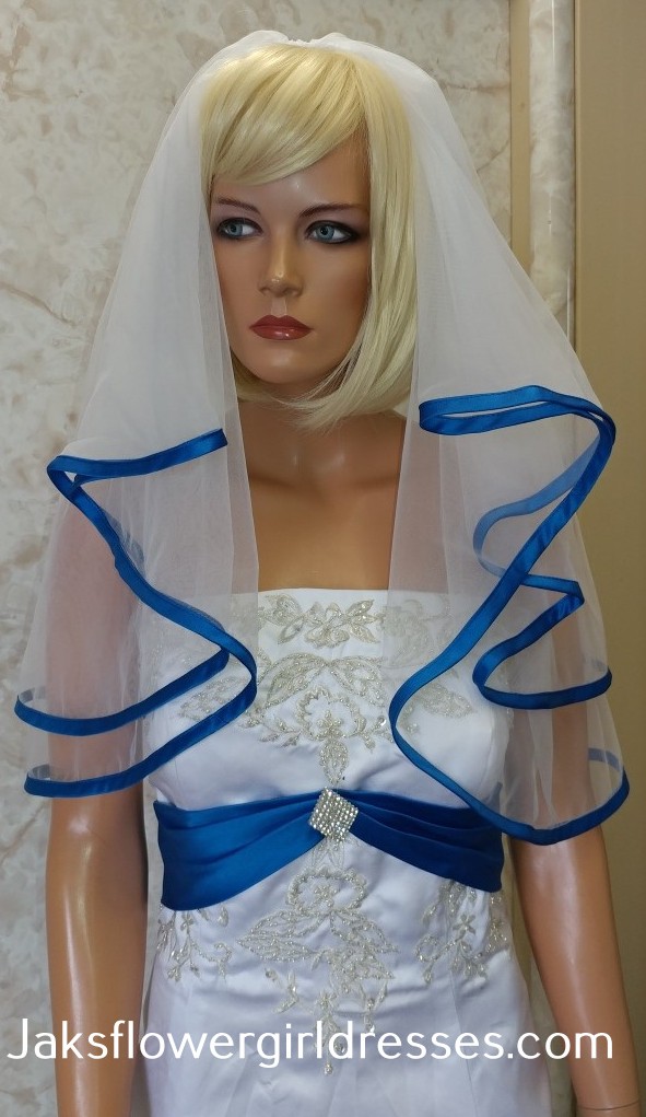 white wedding dress with bright blue