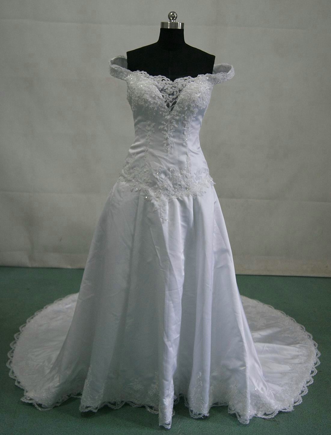 white off shoulder wedding gown
