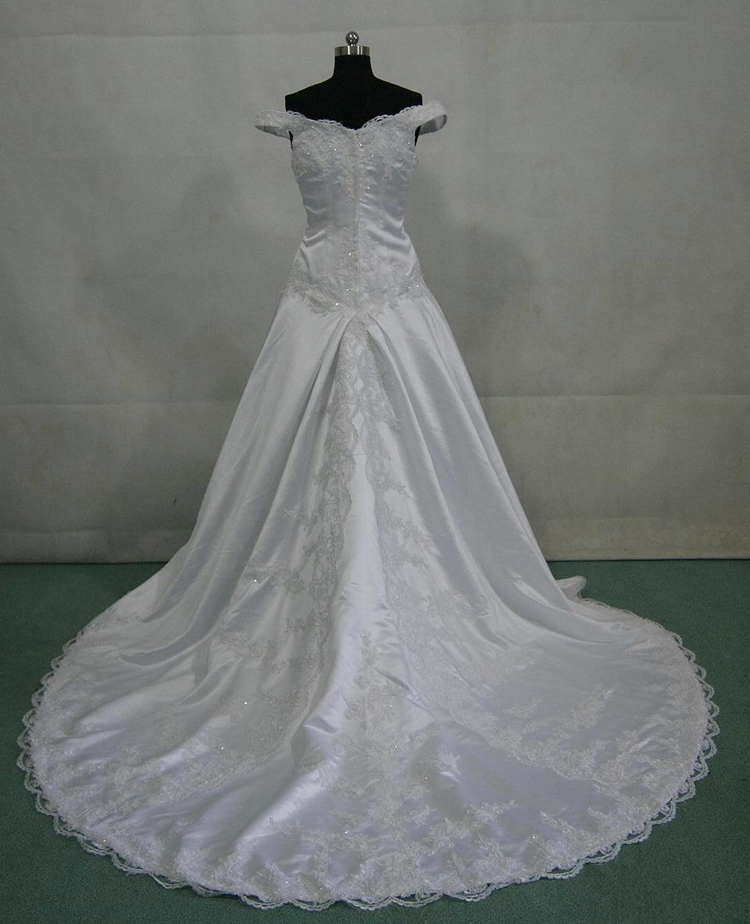 white off shoulder wedding gown