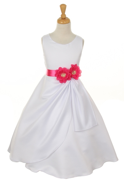 white dress with fuchsia flower sash