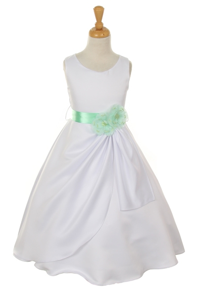 white dress with mint flower sash