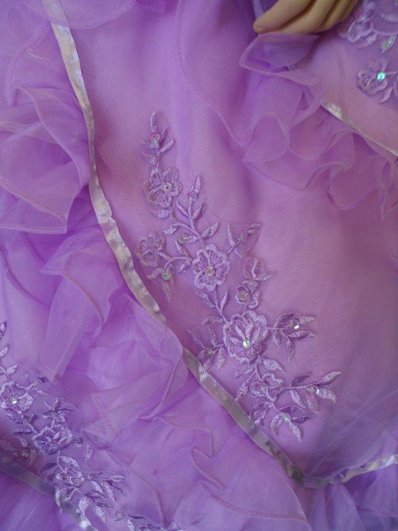crisscross layers of pleated organza with beadwork skirt