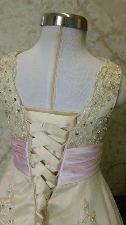 light champagne dress with pink sash