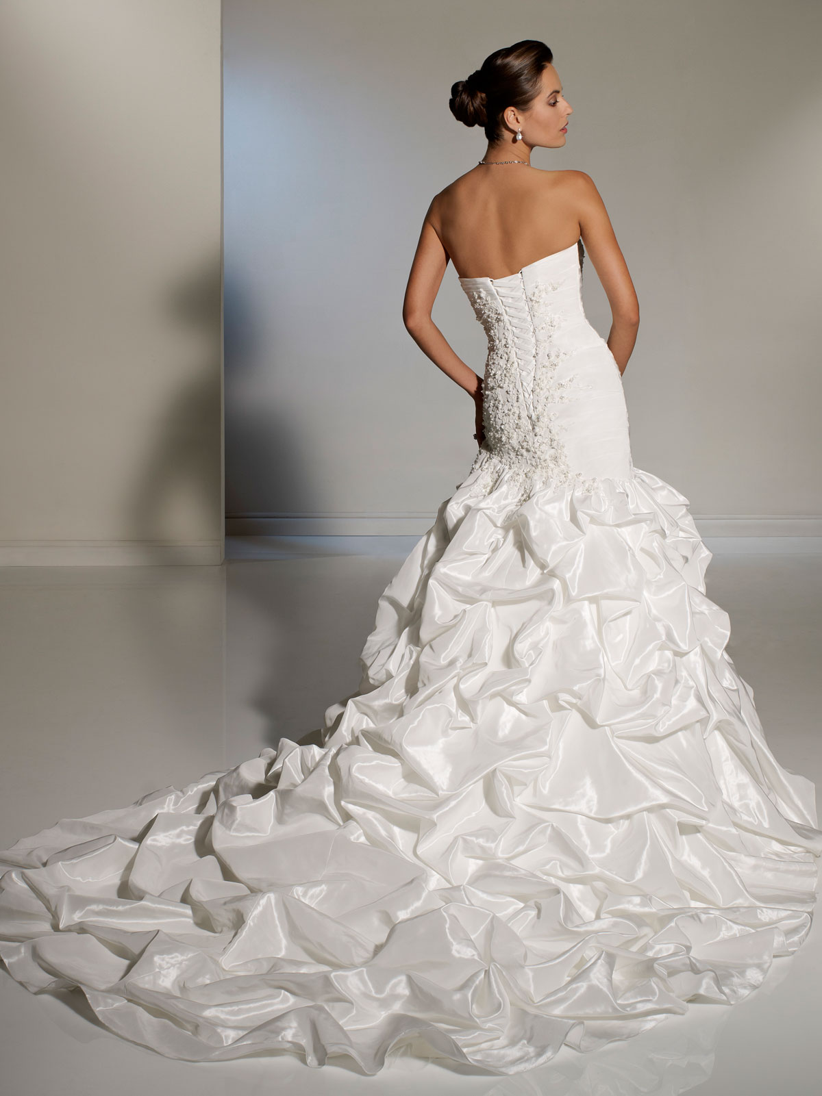 strapless wedding gown with waterfall train
