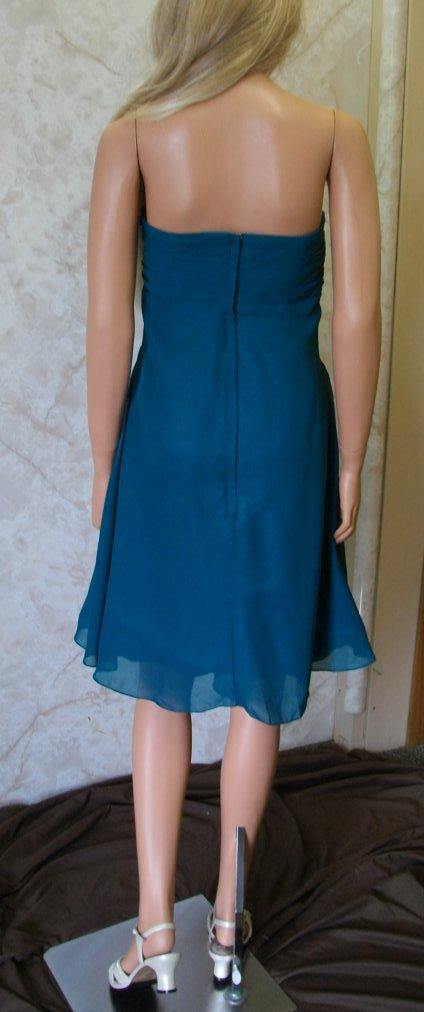 Short blue wrapped bodice bridesmaid gown
