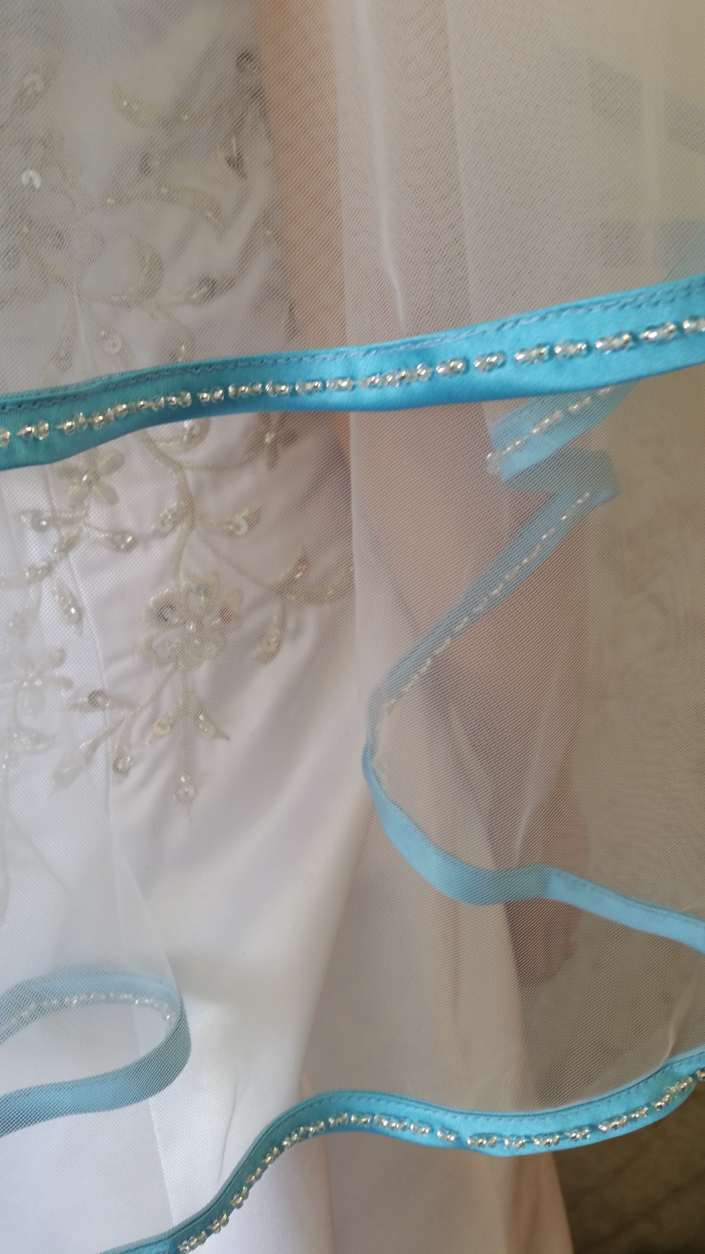ivory and pool blue veil