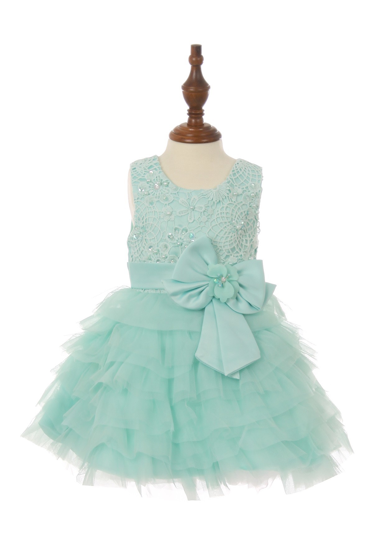 Baby dress with bow, and rows of ruffles