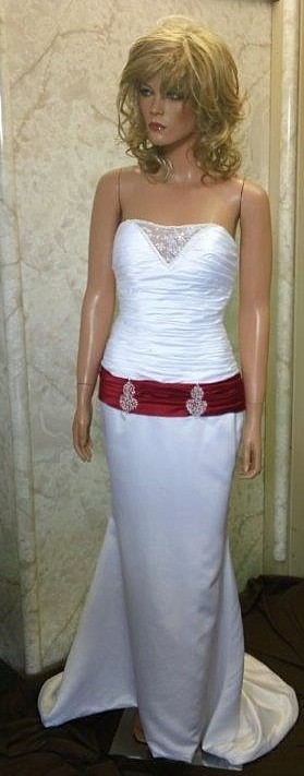 white wedding gown with red dropped sash