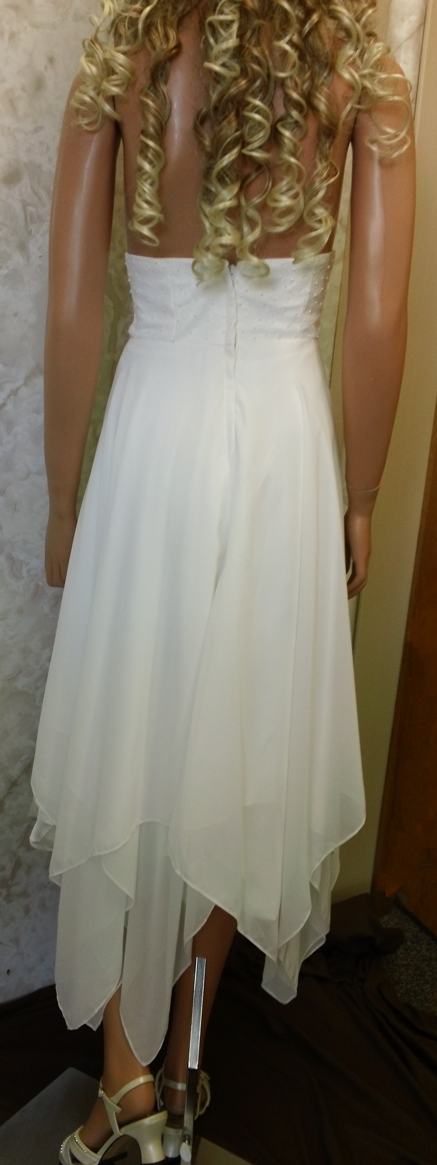 bridal gown with handkerchief hemline