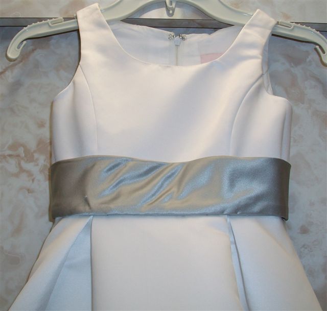 white dress with silver sash