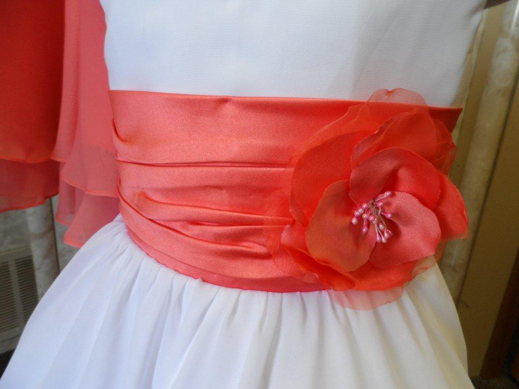 coral and white pleated sash