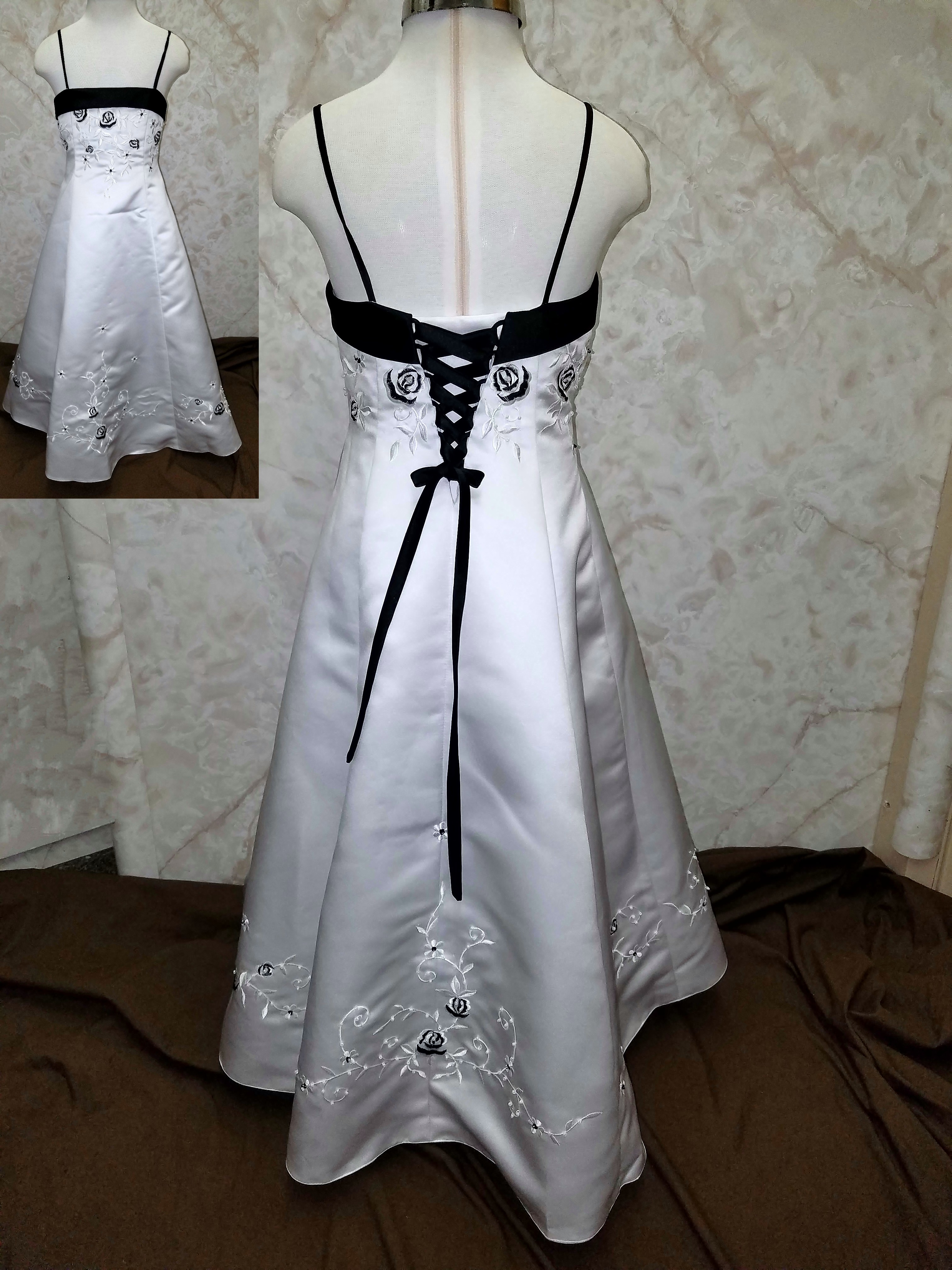 black and white flower girl dresses on sale @ $75.00. Floor length dress with embroidered bodice and skirt. 