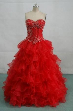 Red strapless see through bodice ball gown