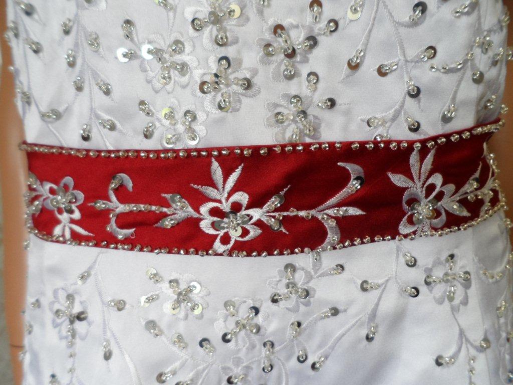 white wedding gown with red embroidered waist