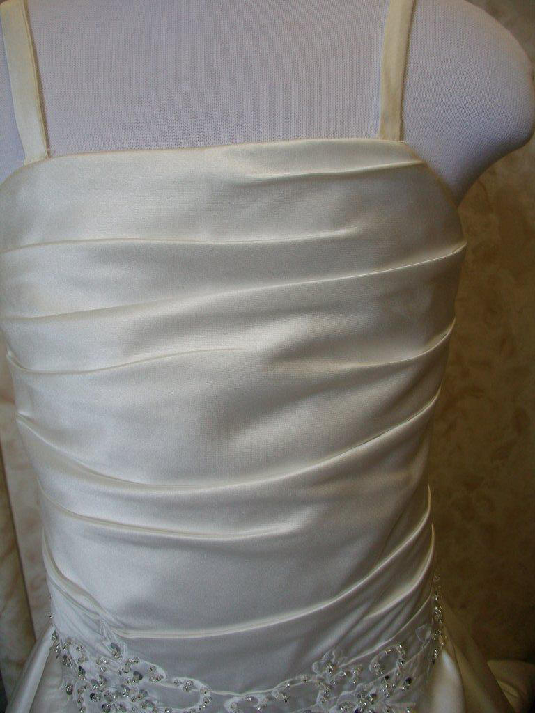 asymmetrically wrapped mini bridal gown