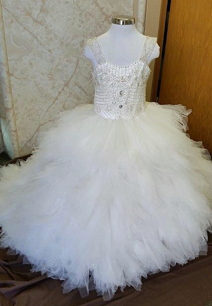 flower girl dress with layers of ruffled tulle