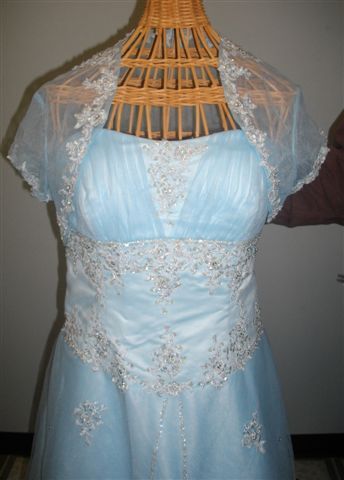 Strapless blue prom gown with jacket