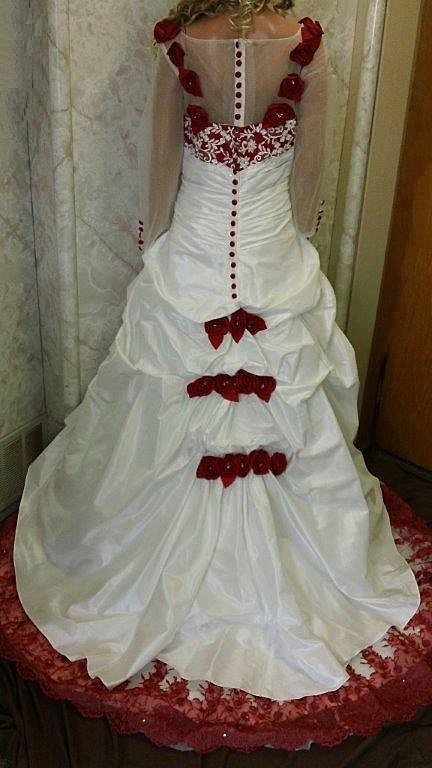 light ivory wedding gown with red roses