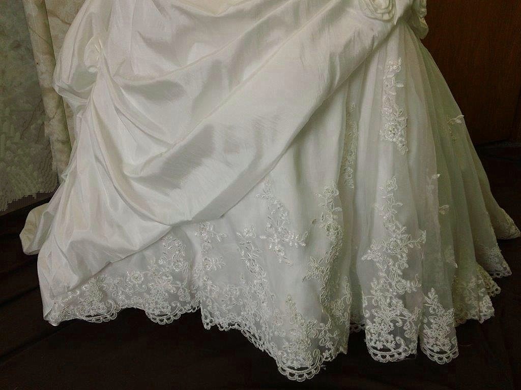 ivory matching wedding dress and flower girl dress