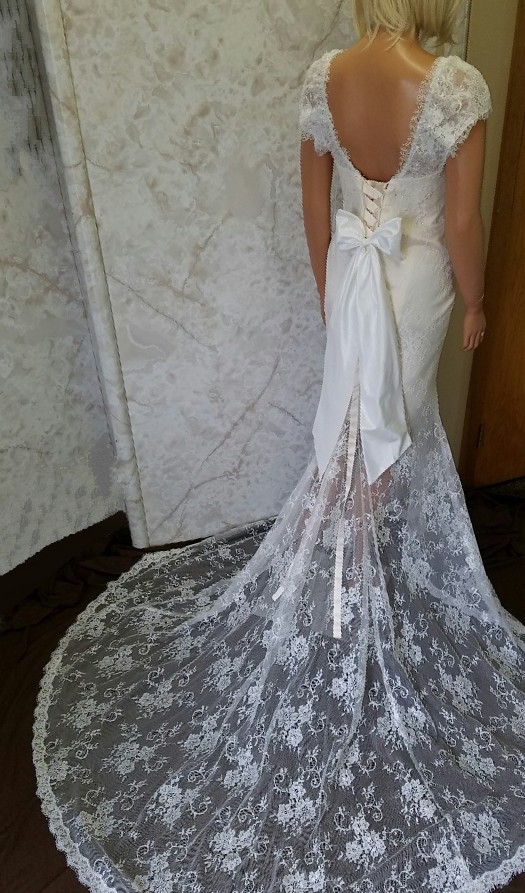 lace wedding dress with sheer train