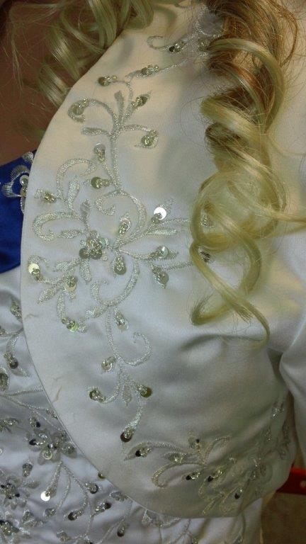embroidered bolero and wedding dress