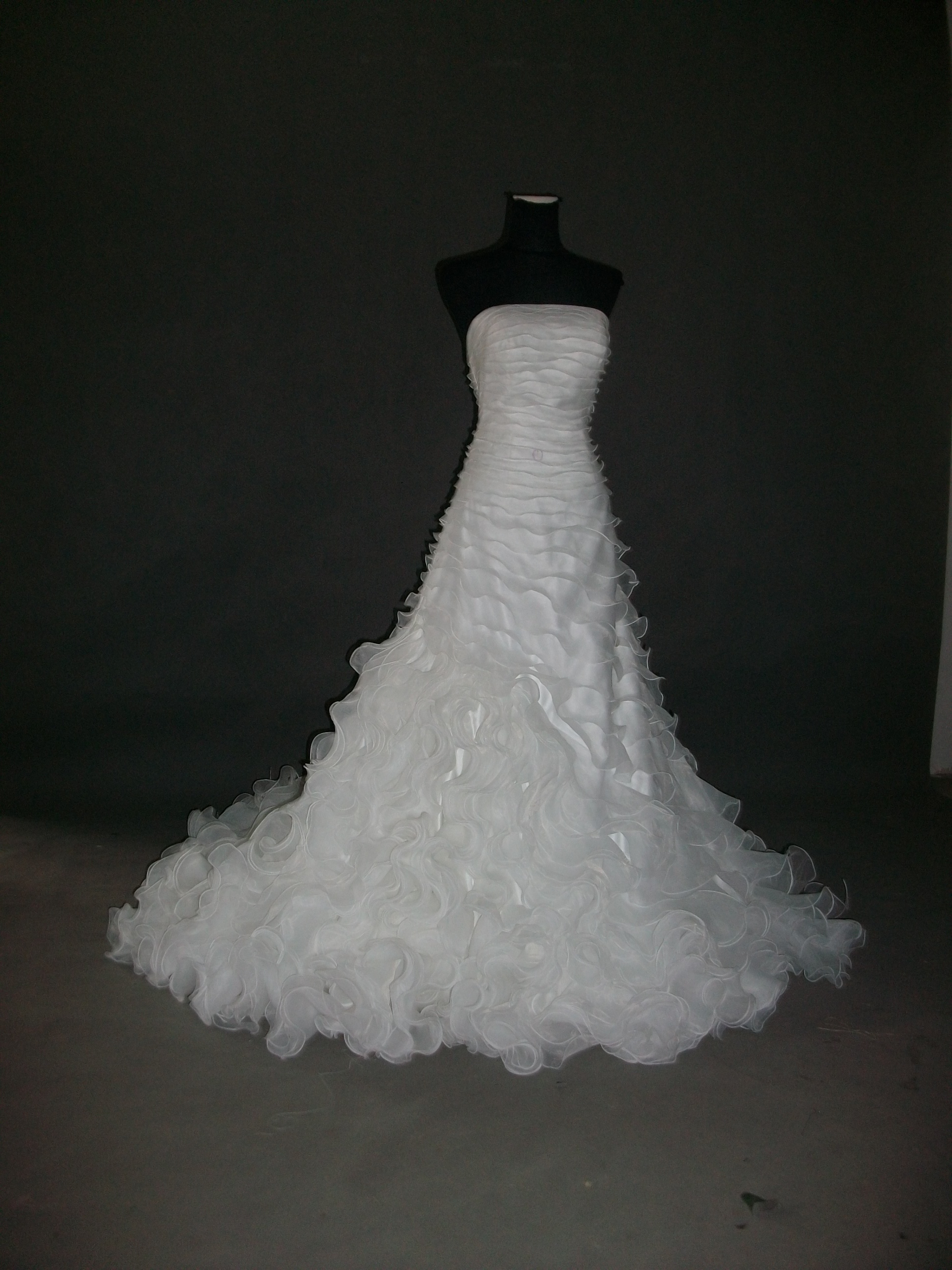wedding dress with asymmetrical pleated bodice