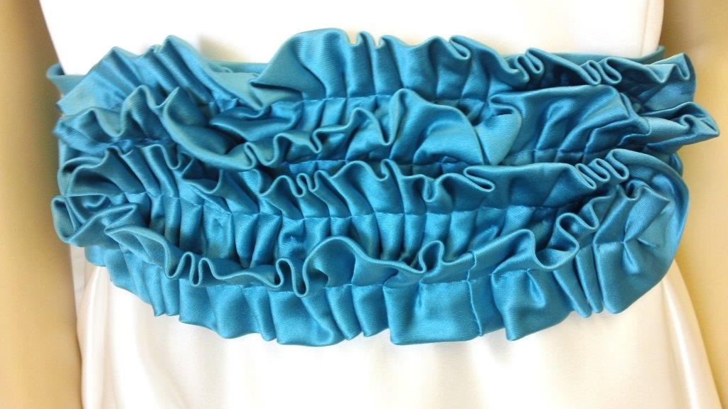 ivory dress turquoise sash