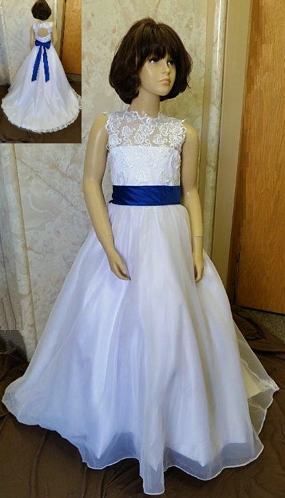 white dress with royal blue sash