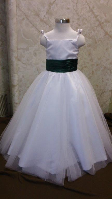 white dress with green sash