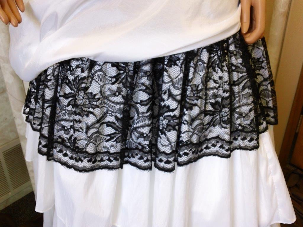 Black lace on tiered skirt wedding gown