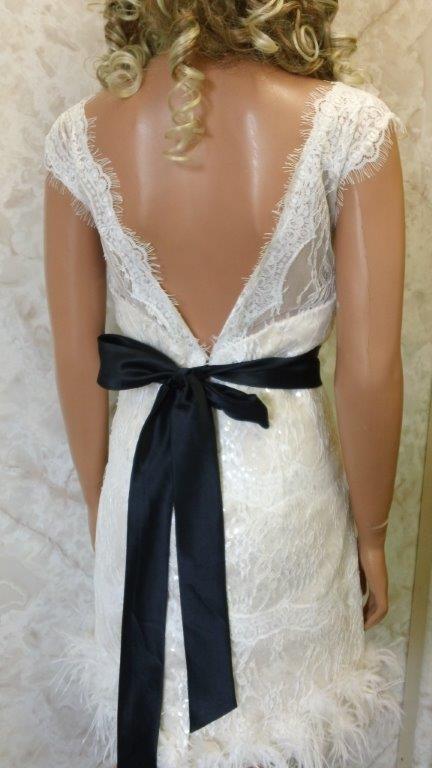 lace wedding gown with black sash