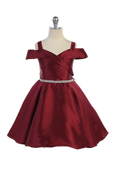 Burgundy off the shoulder knee length dress, rhinestone trim at waist and two large pockets.