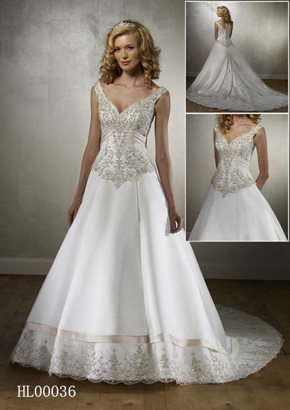 wedding gown beautifully edged with scalloped embroidery