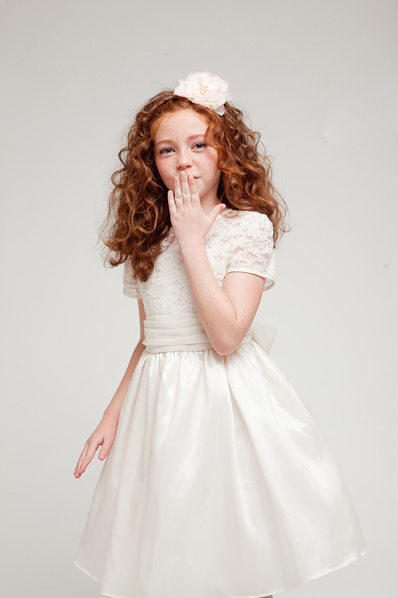 Girls ivory lace dress, short sleeve, knee length, on sale for $40.