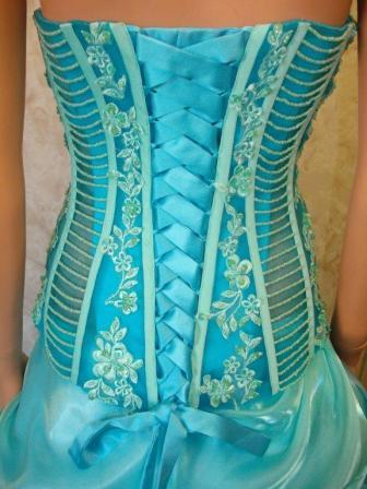 corset top is harnessed with beading and embroidery