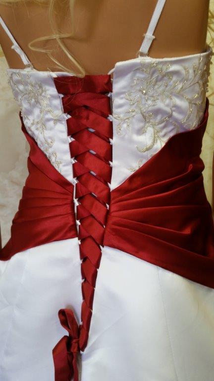 wedding gown with red accents