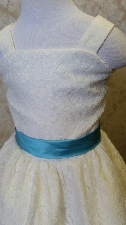 ivory lace dresses with pool blue sash