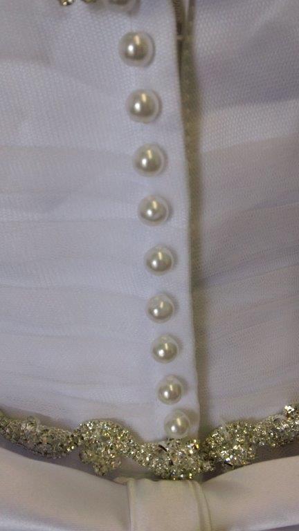 covered buttons over zipper