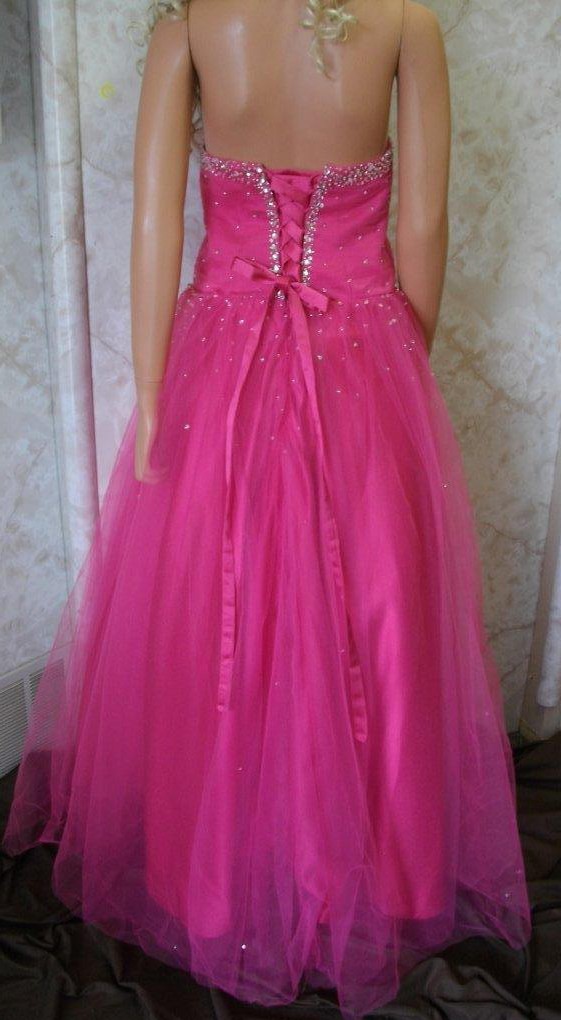 long  watermelon prom gown with corset back