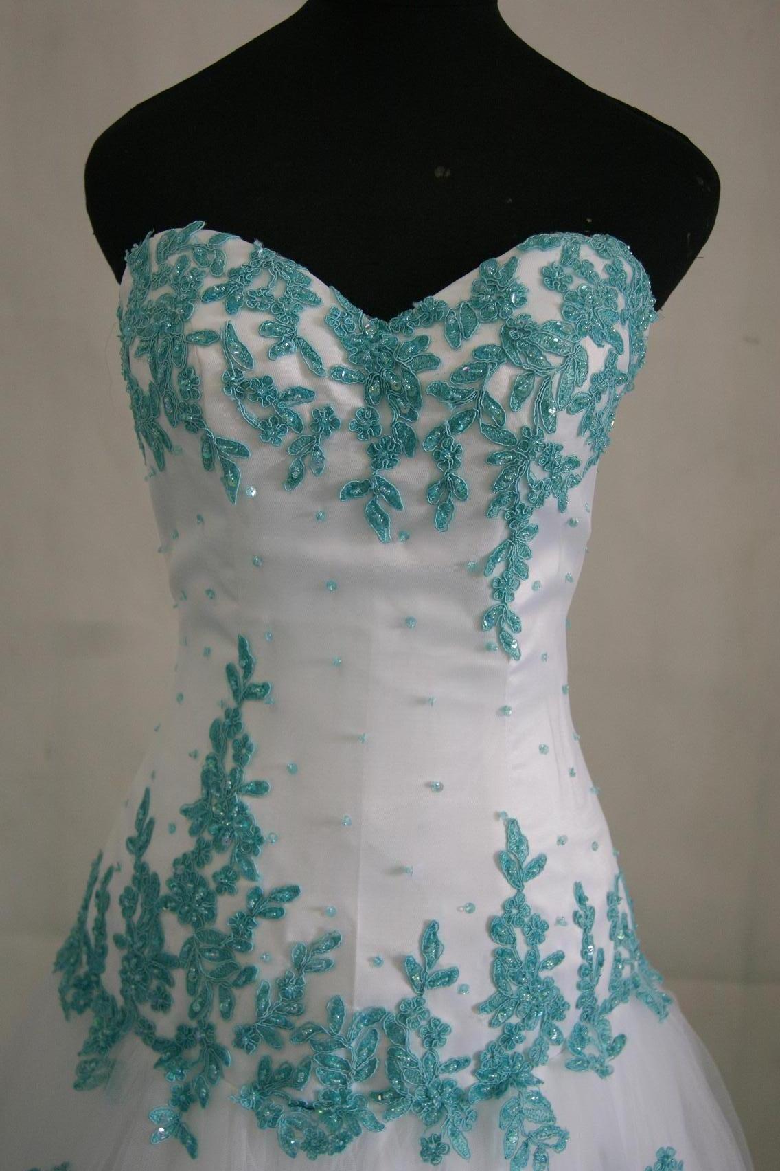 White dress with turquoise appliques