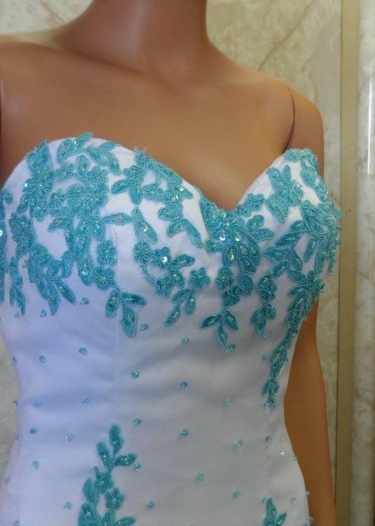 sweetheart bodice with turquoise sequin appliques