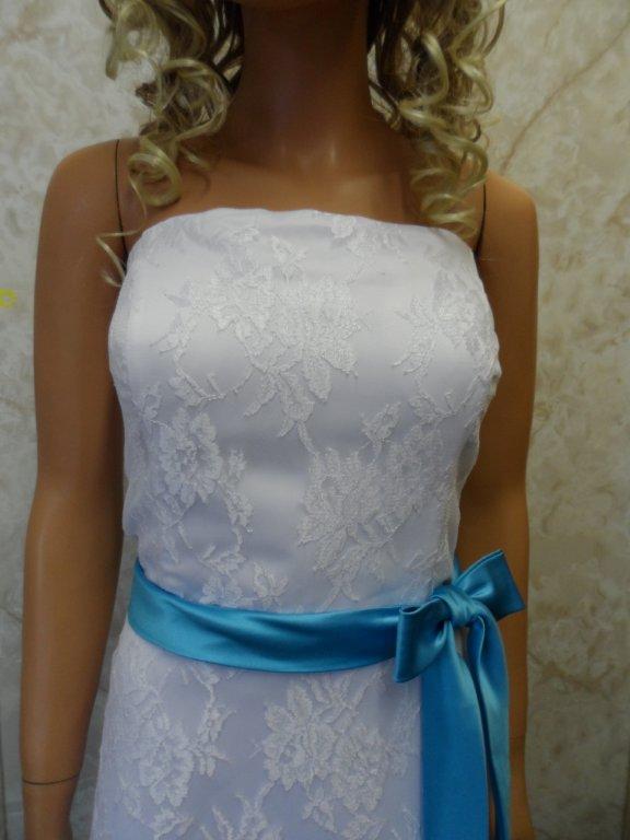 White lace wedding gown with pool blue sash
