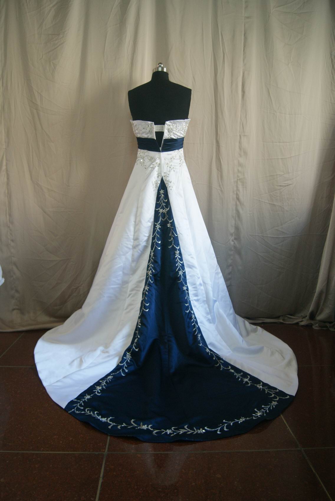 white and navy wedding gown
