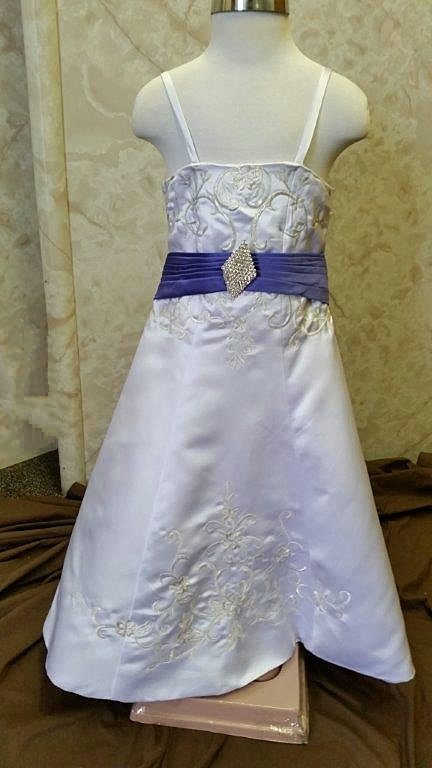 White wedding gown with purple waistline and train