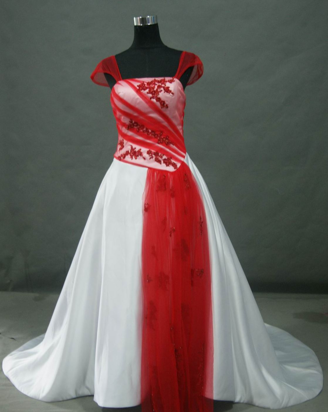 Red and white wedding dress with cap sleeves.
