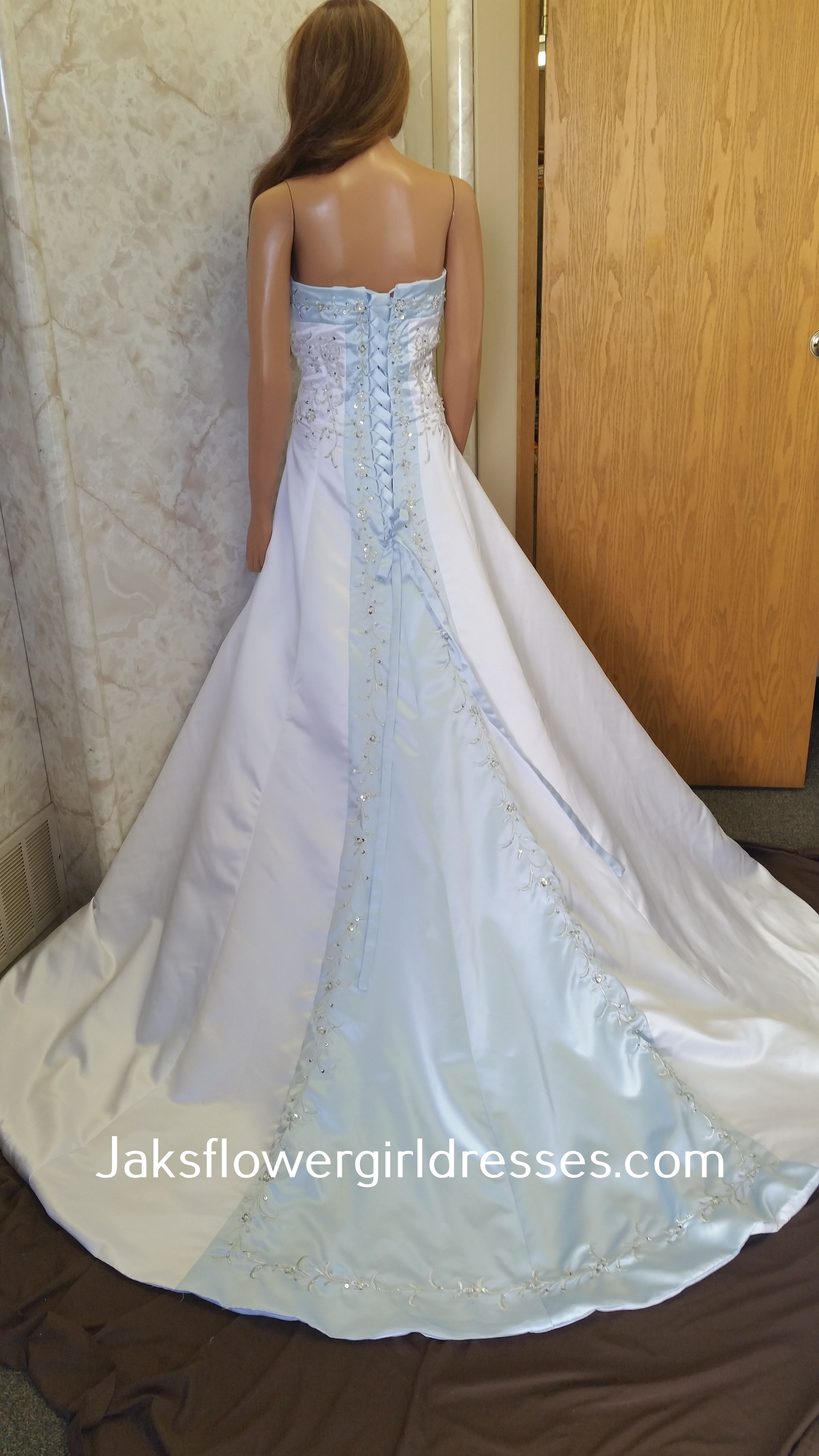 white and light blue wedding gown