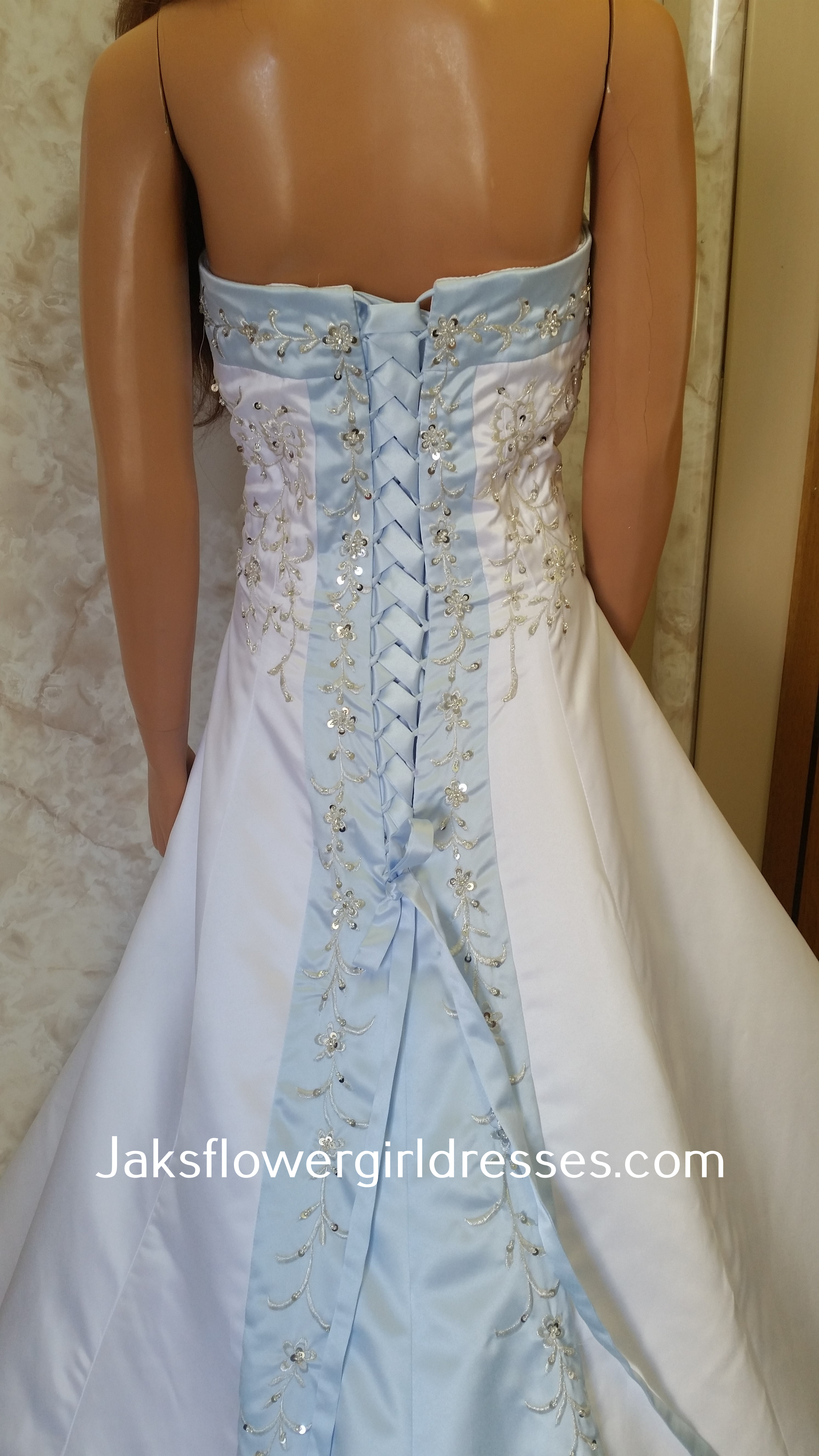 white and light blue wedding gown