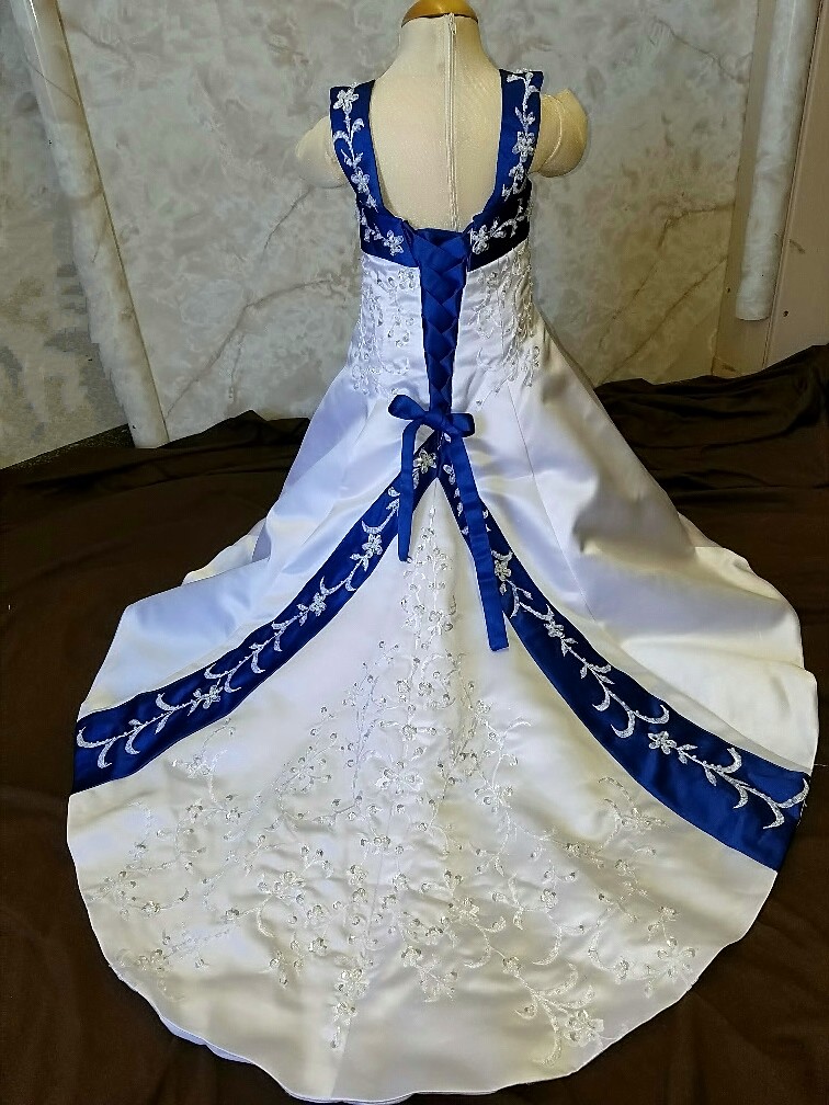 infant wedding dress in white and royal blue