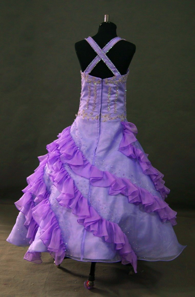 purple pageant dress with ruffled skirt